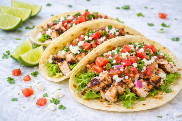 Picture of Grilled Chicken Tacos With Fresh Toppings.